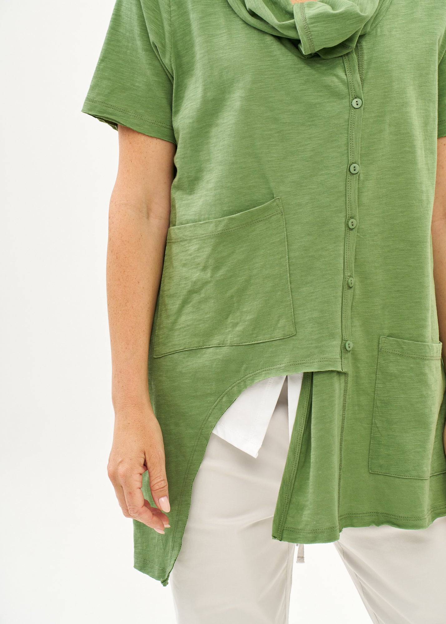 Green short-sleeved collared and buttoned top