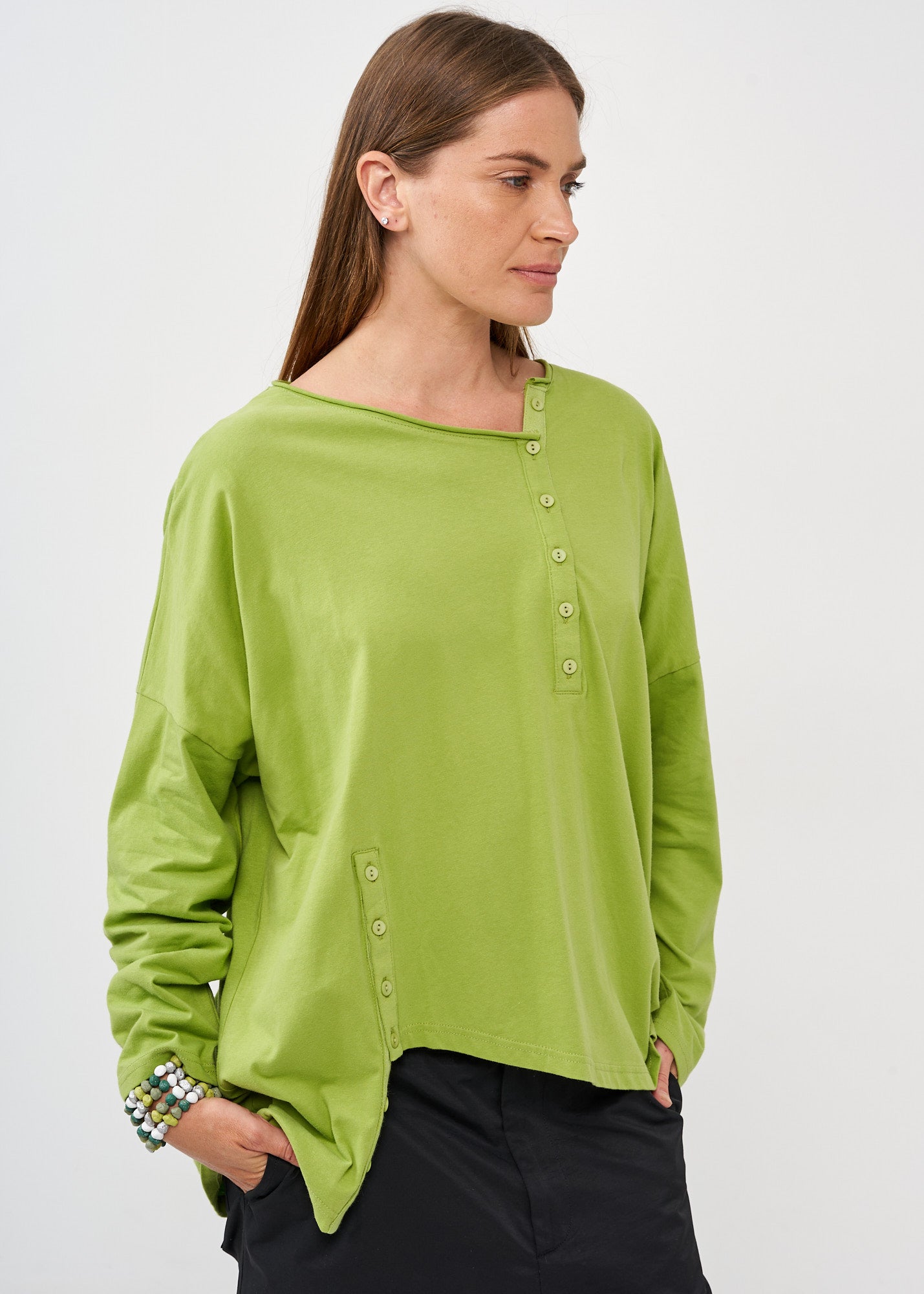 Green two-button long-sleeved shirt