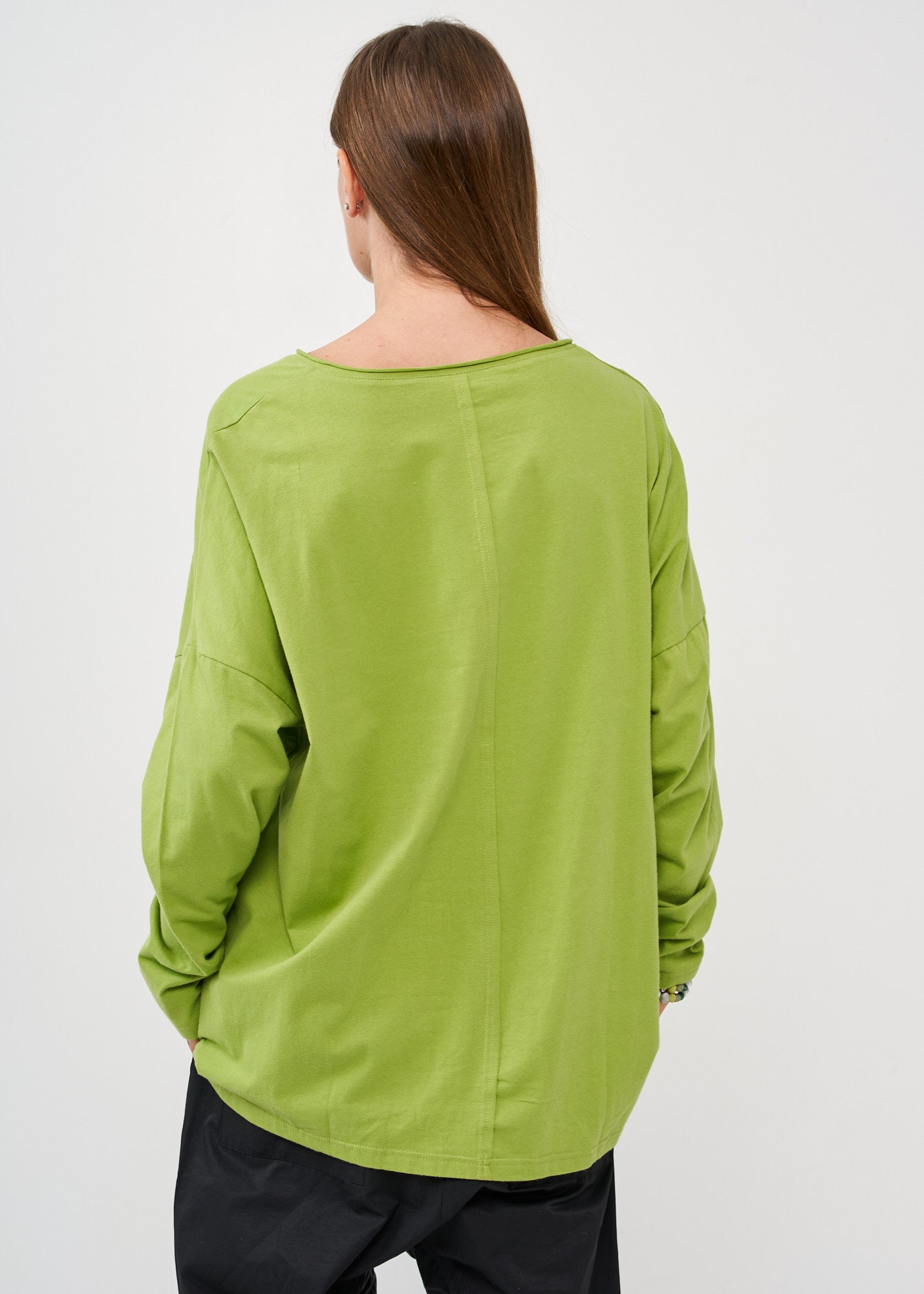 Green two-button long-sleeved shirt