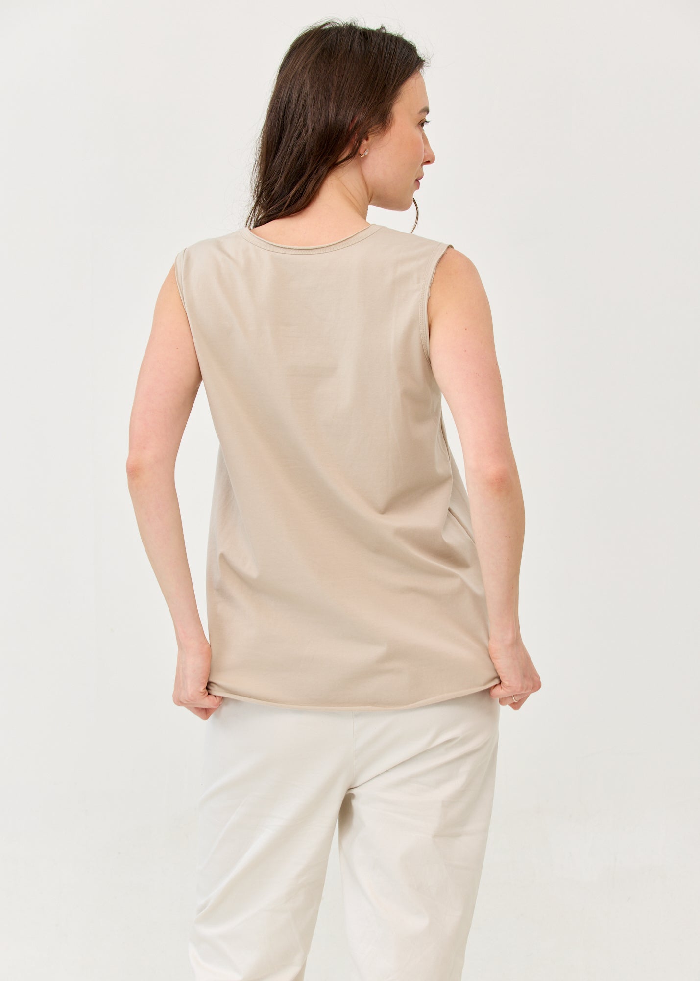 V-neck tank top with diagonal stitching and stone accents