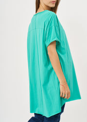 Turquoise open-sleeve shirt with asymmetrical hem