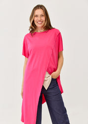 Fuchsia pink short-sleeve tunic with an asymmetrical cut