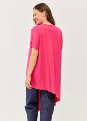 Fuchsia pink short-sleeve tunic with an asymmetrical cut