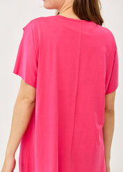 Fuchsia pink short-sleeve tunic with an asymmetrical cut