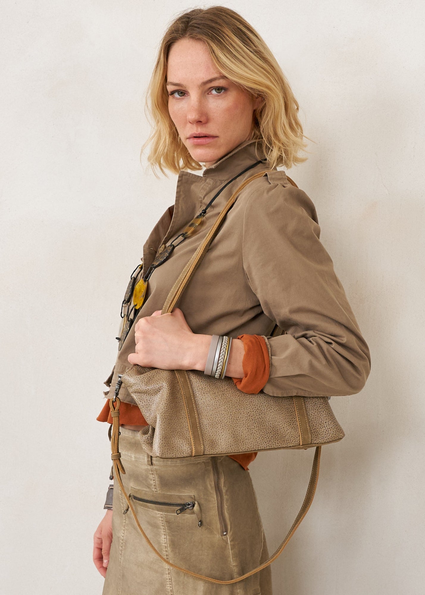 Rectangular leather evening bag in gray color combination