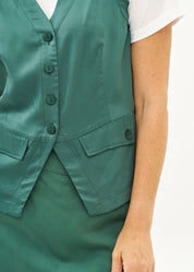 Green vest with angled pockets and tie-back