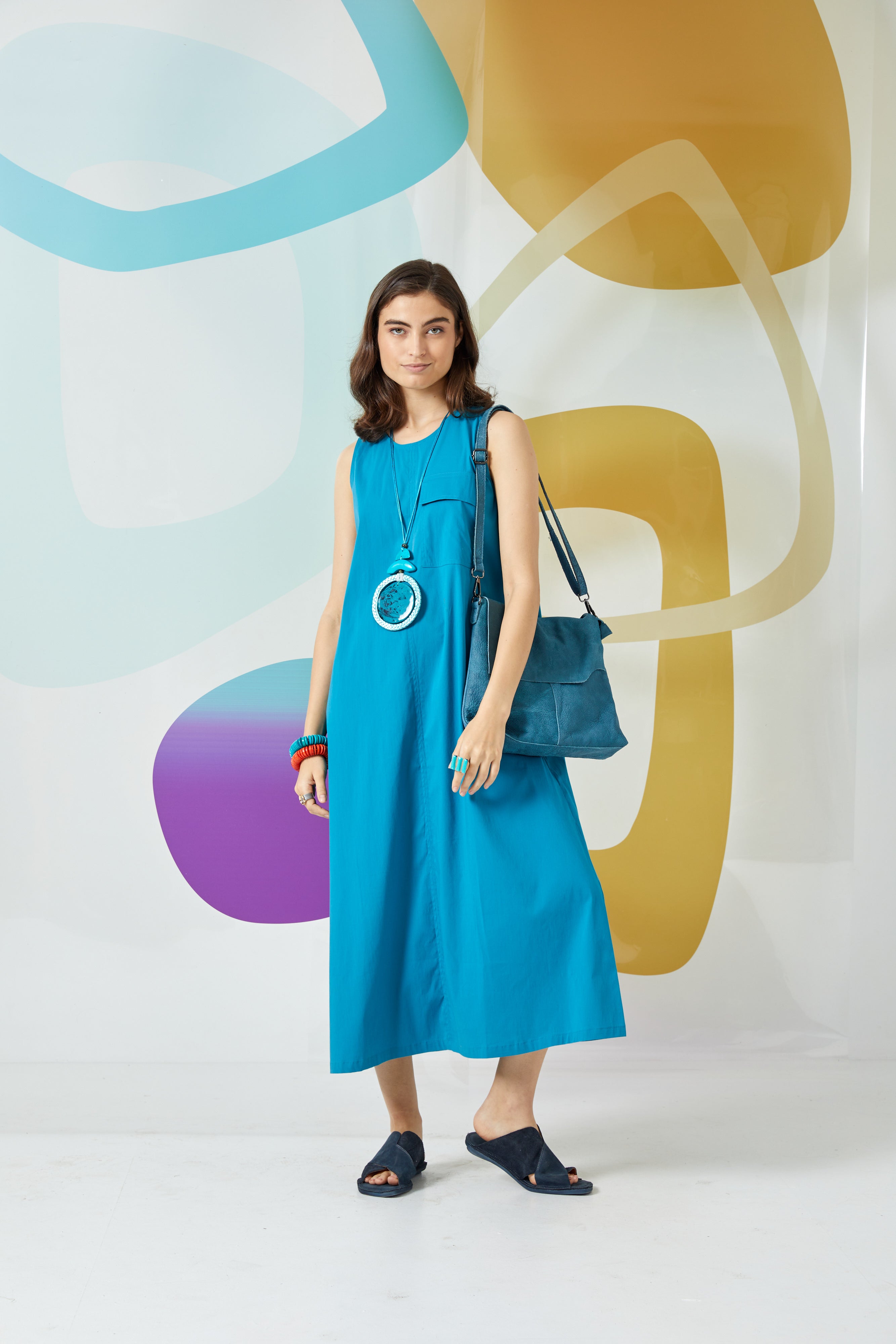 Turquoise cut leather side bag