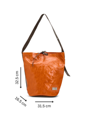 Leather bucket bag with orange button strap