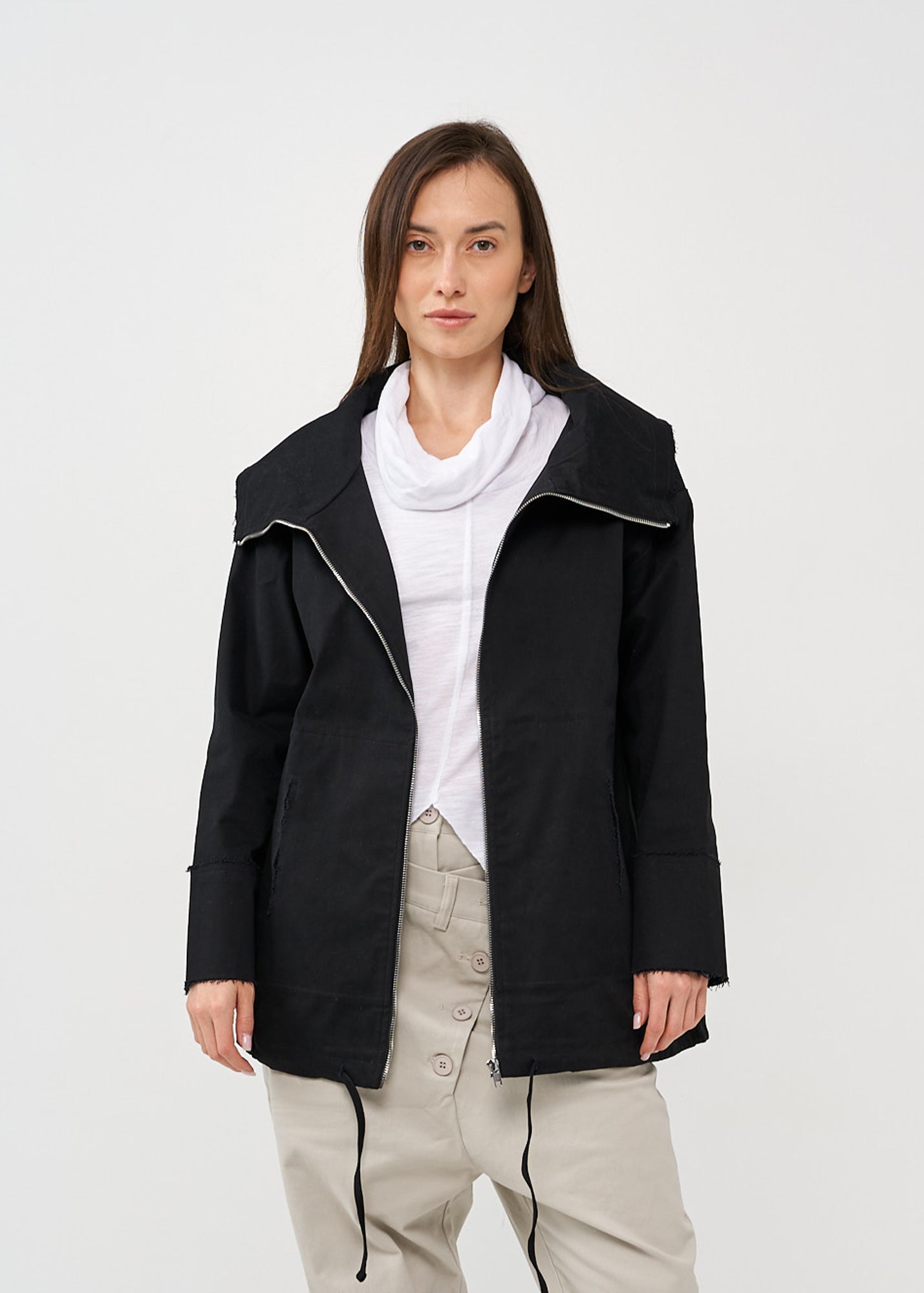 Black zipped jacket with cut-out pockets
