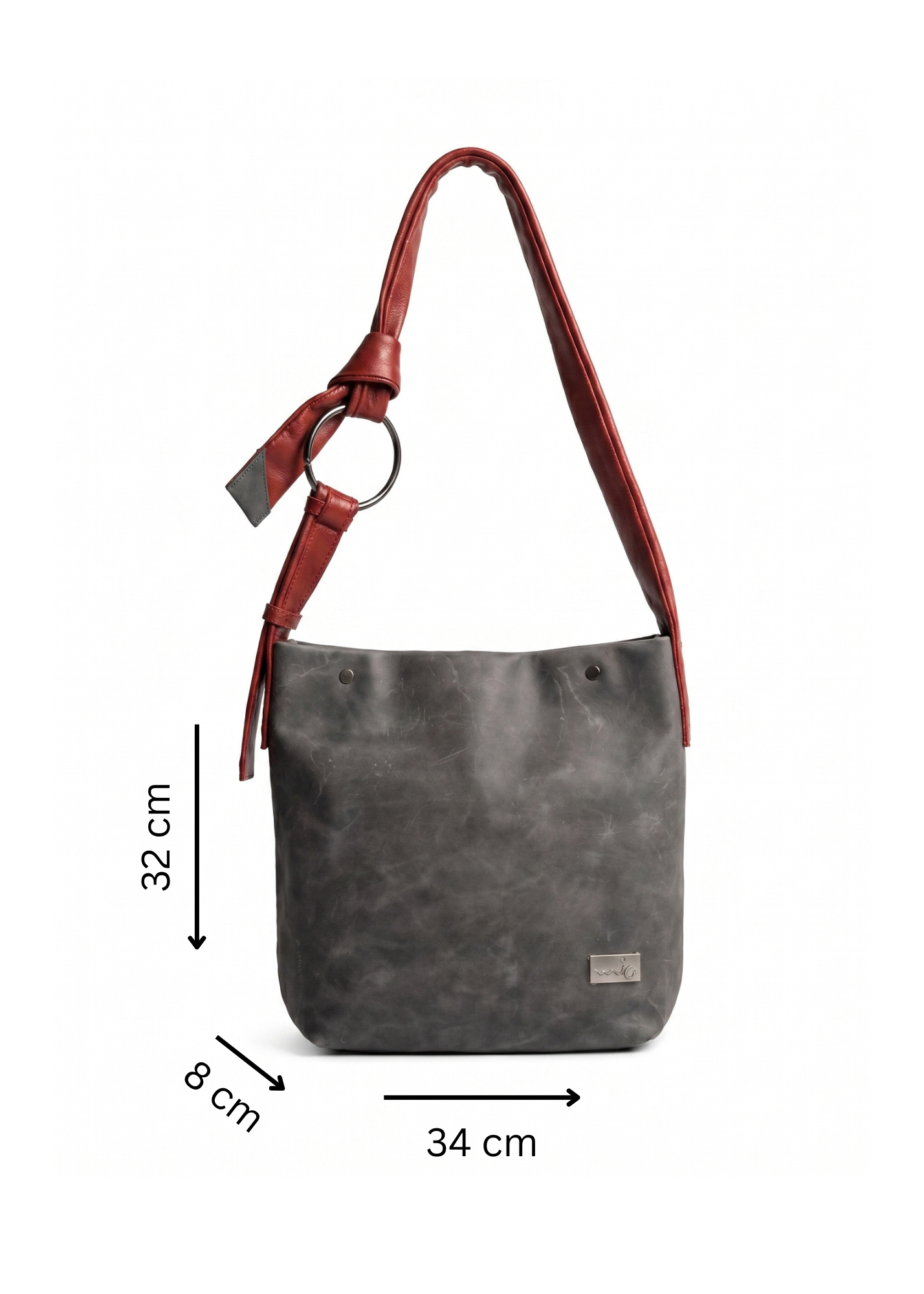 Red leather bag with a tie-on strap