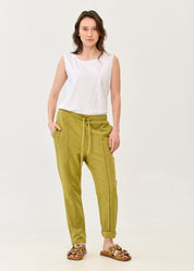 Pants seam in the middle and a green patch