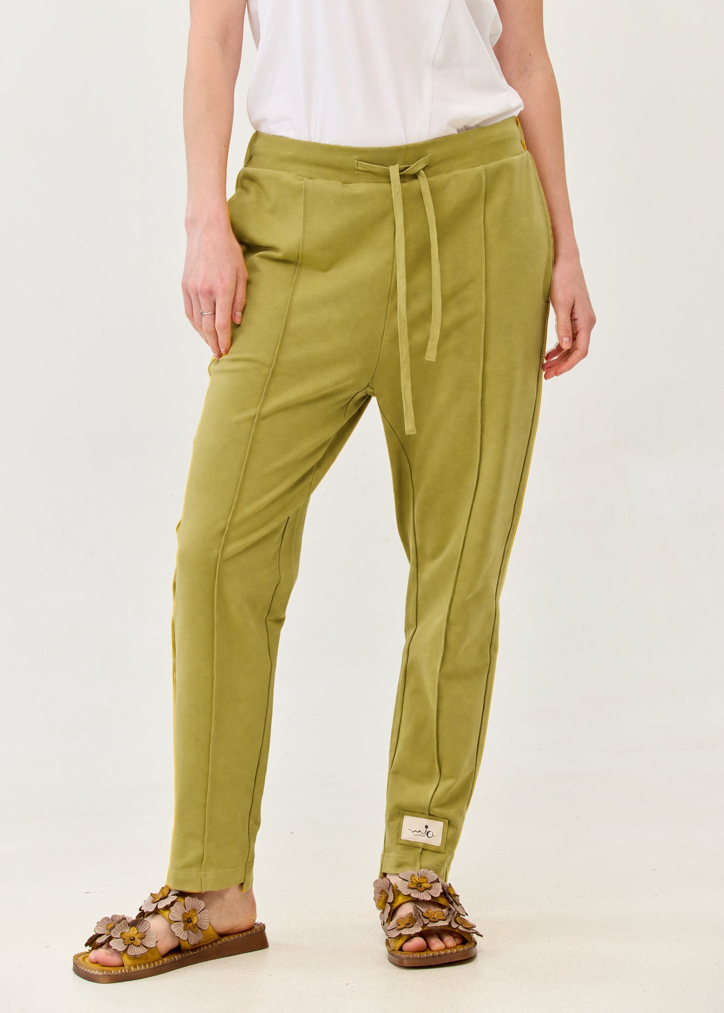 Pants seam in the middle and a green patch