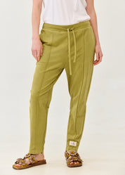 Pants seam in the middle and a green patch