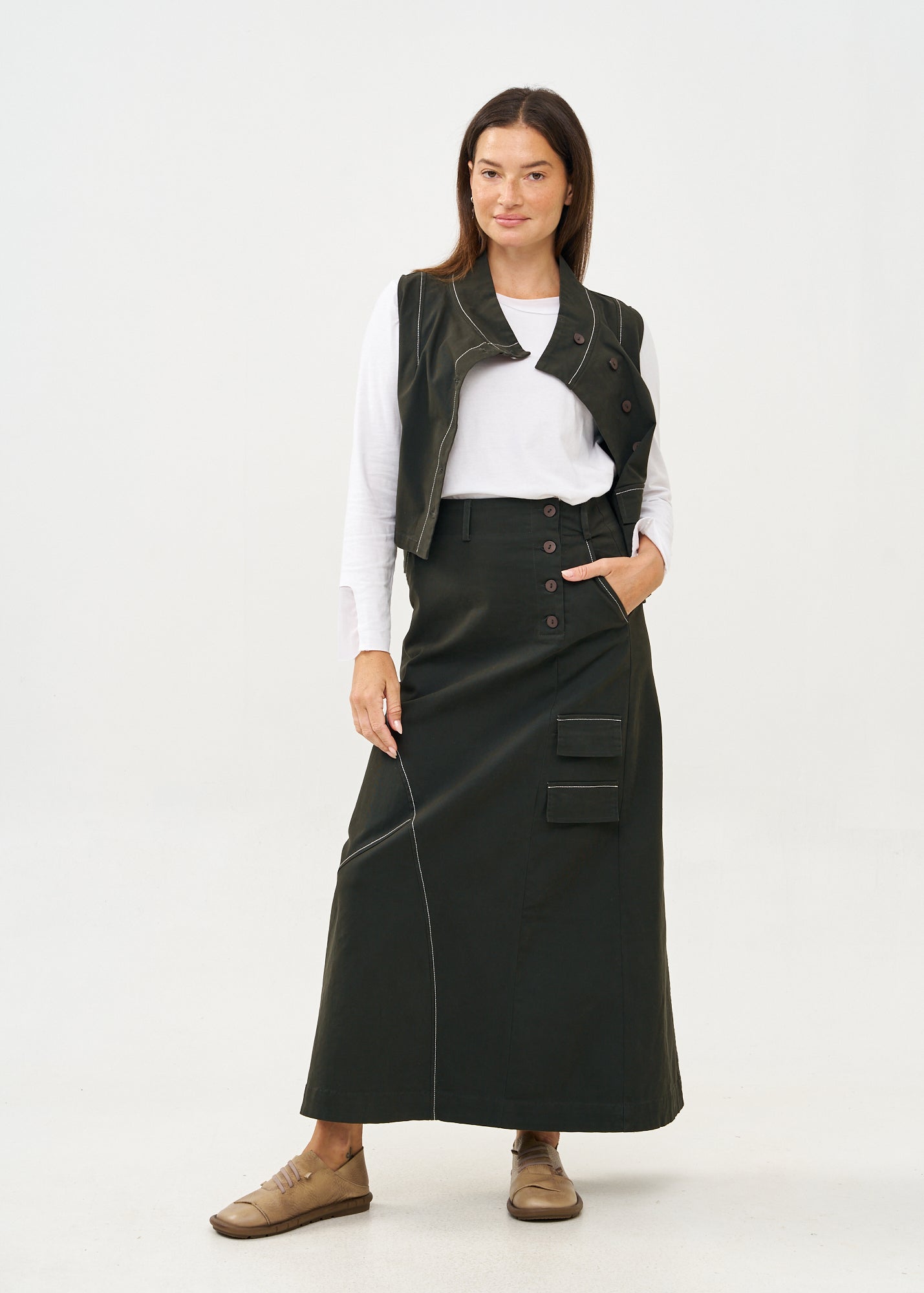 Asymmetrical vest with prominent stitching in gray