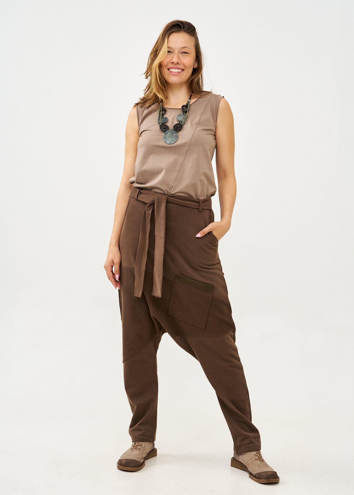 Reverse cut baggy pants with brown belt