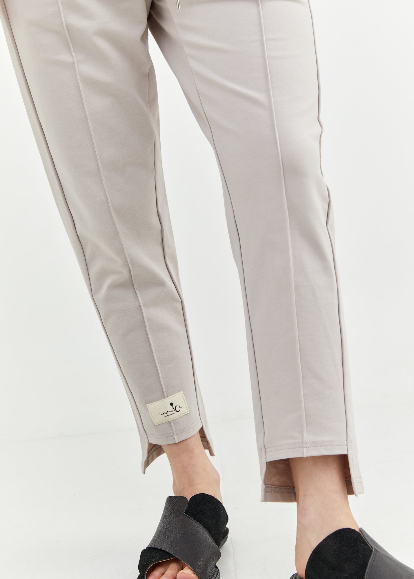 Pants seam in the middle and a gray patch