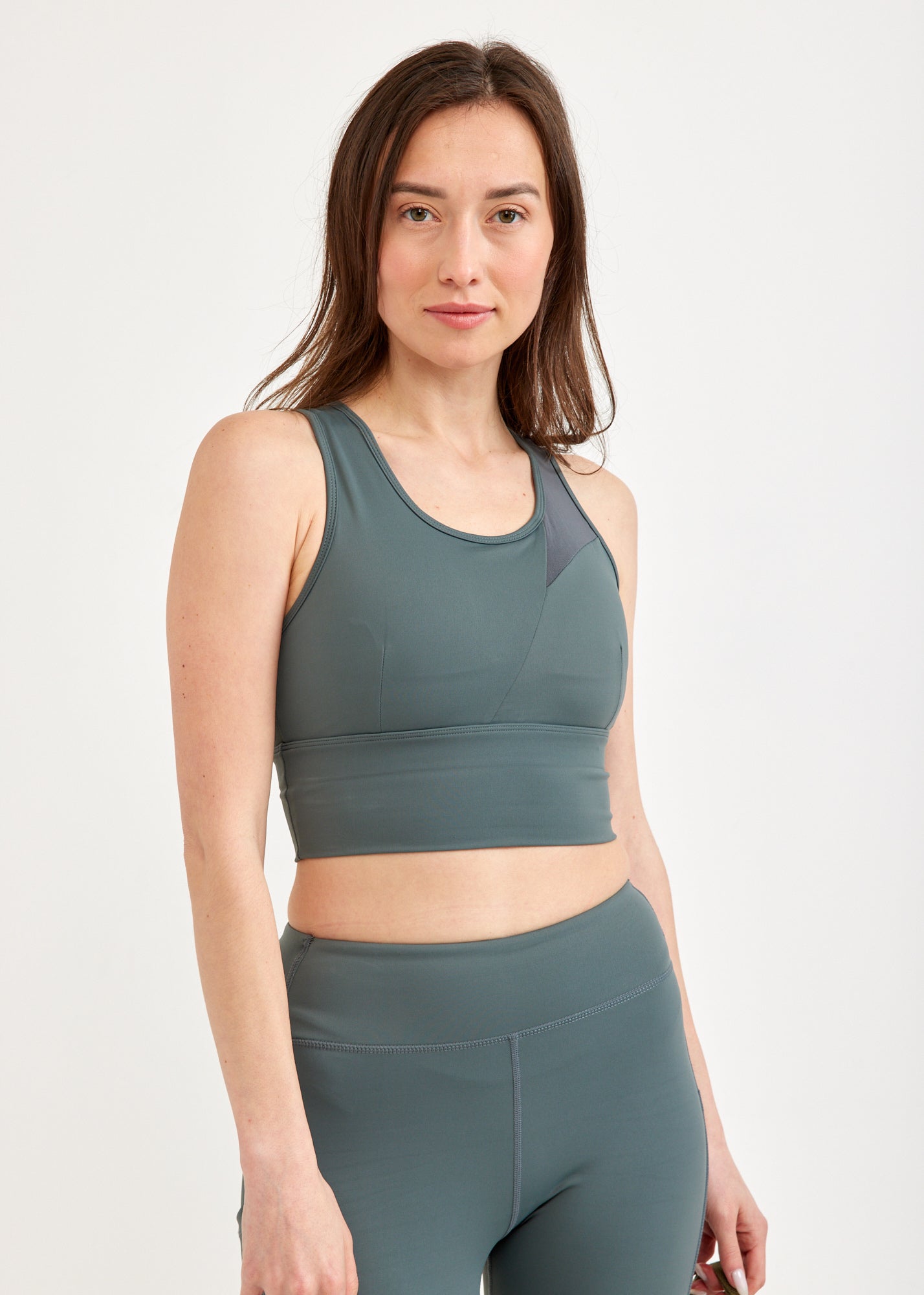 Dark green mesh training top with diagonal cuts