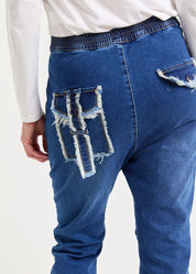 Boy jeans back pockets blue wash