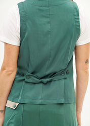 Green vest with angled pockets and tie-back