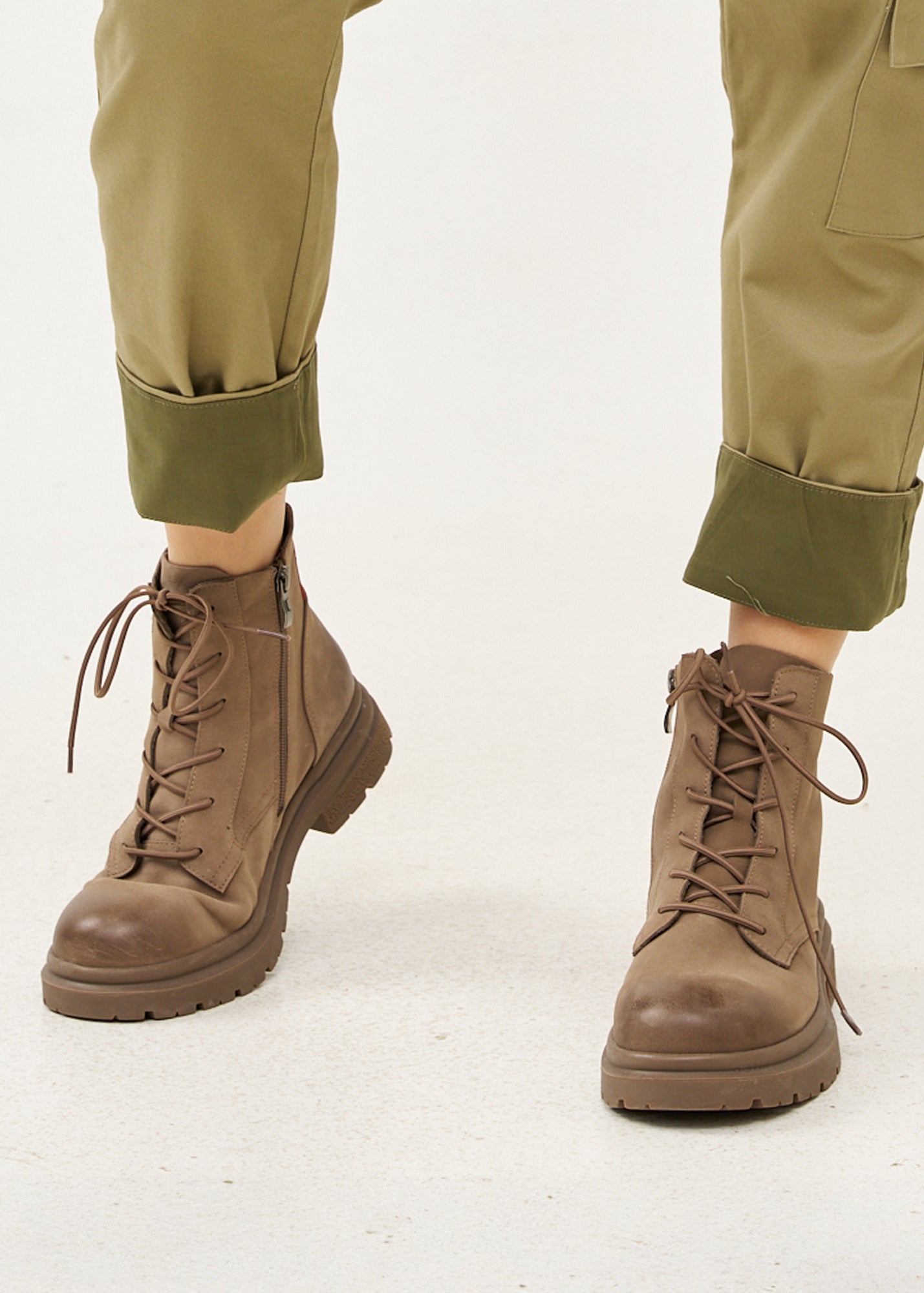 Brown leather boots with laces and zipper