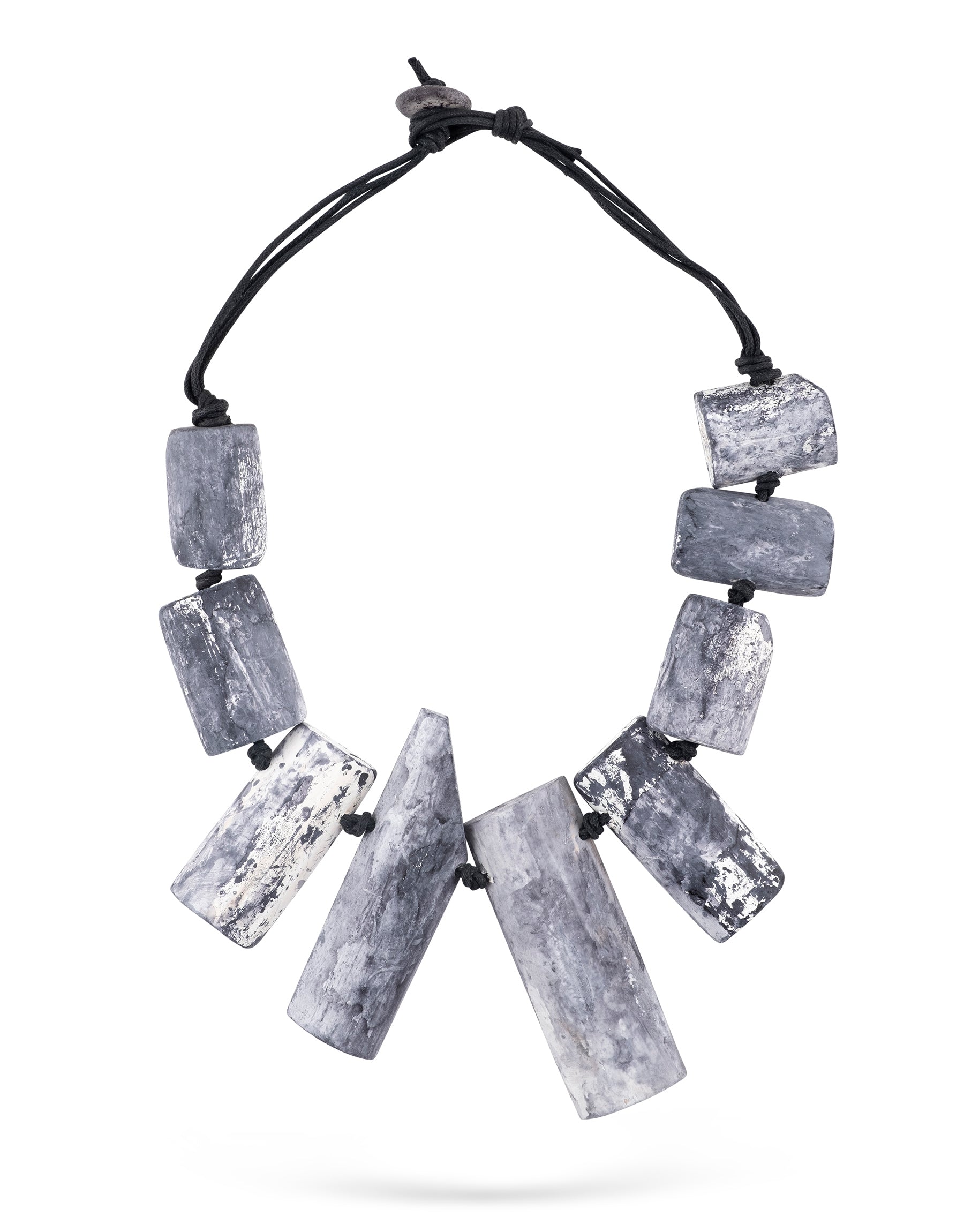 A chain of flaking wood attached to gray rectangular shapes