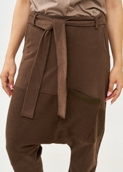 Reverse cut baggy pants with brown belt