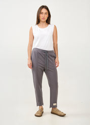 Pants with a seam in the middle and a dark gray patch