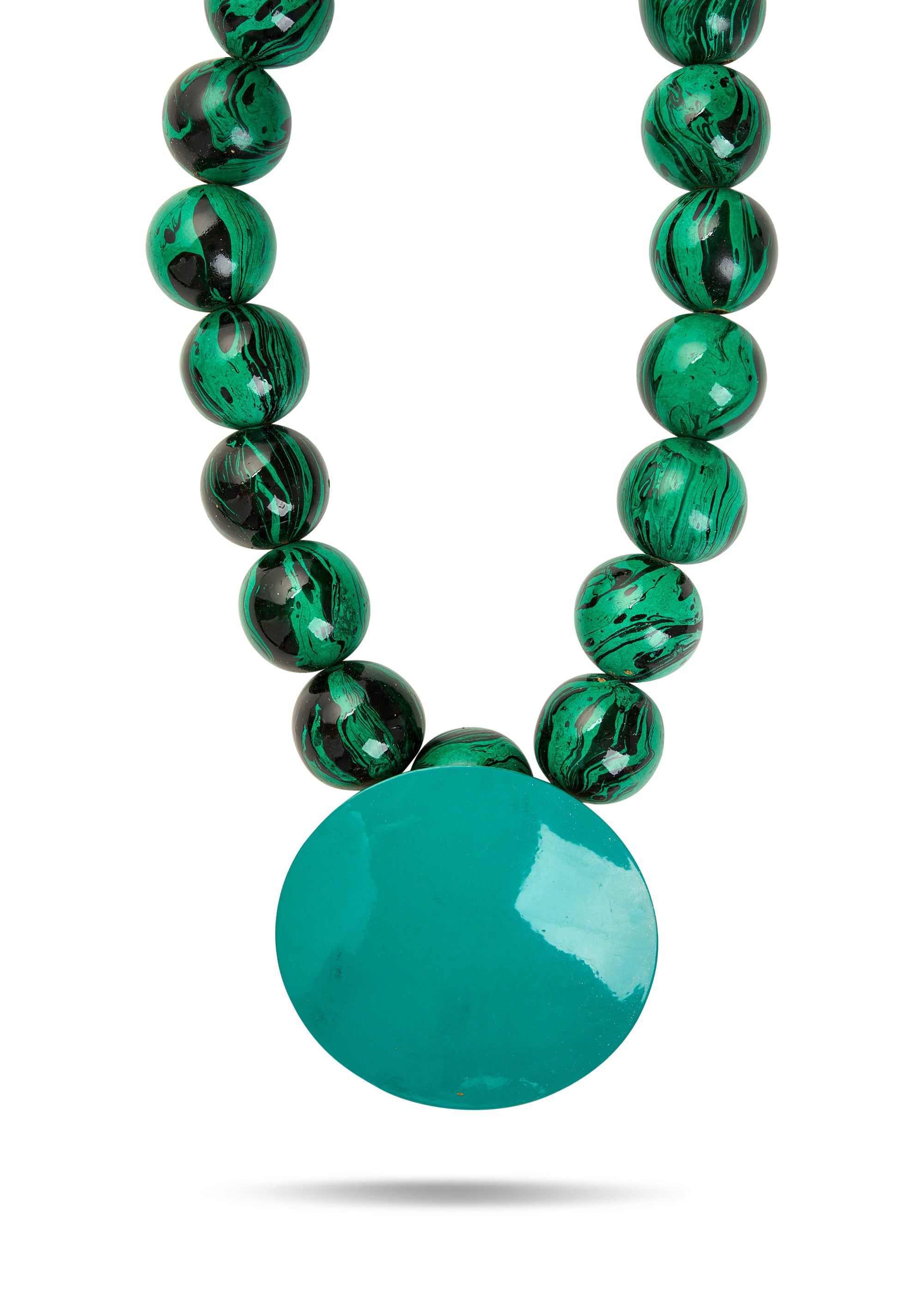 A necklace of wooden beads and a large green disc