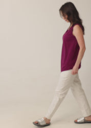 V-neck tank top with diagonal stitching and stone accents