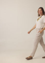 Pants with button and zipper cutouts, Stone