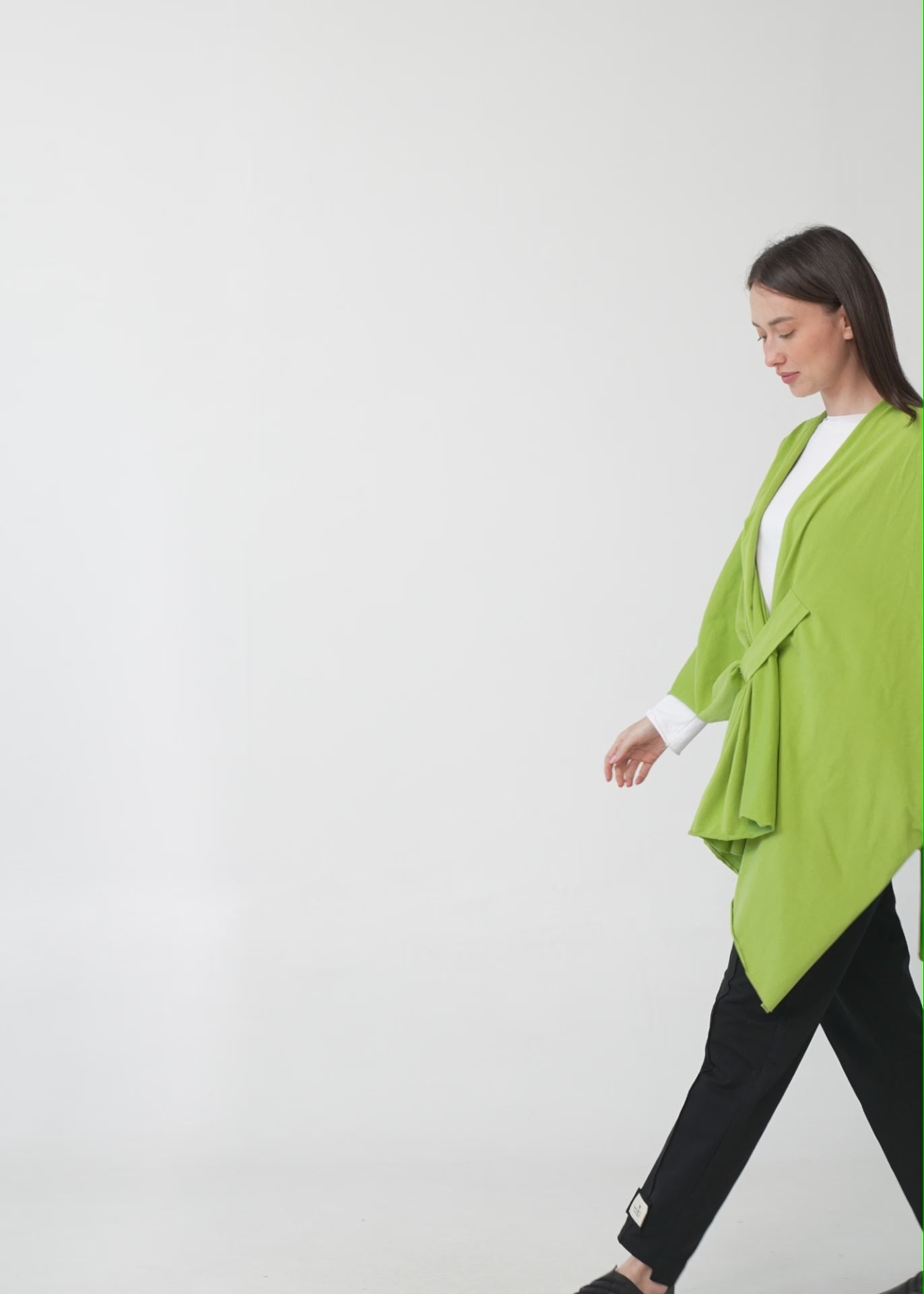 Black cape with diagonal closure