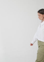 Black button-down shirt with long shoulder straps