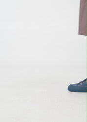 High-top leather shoes with laces in stone color combination