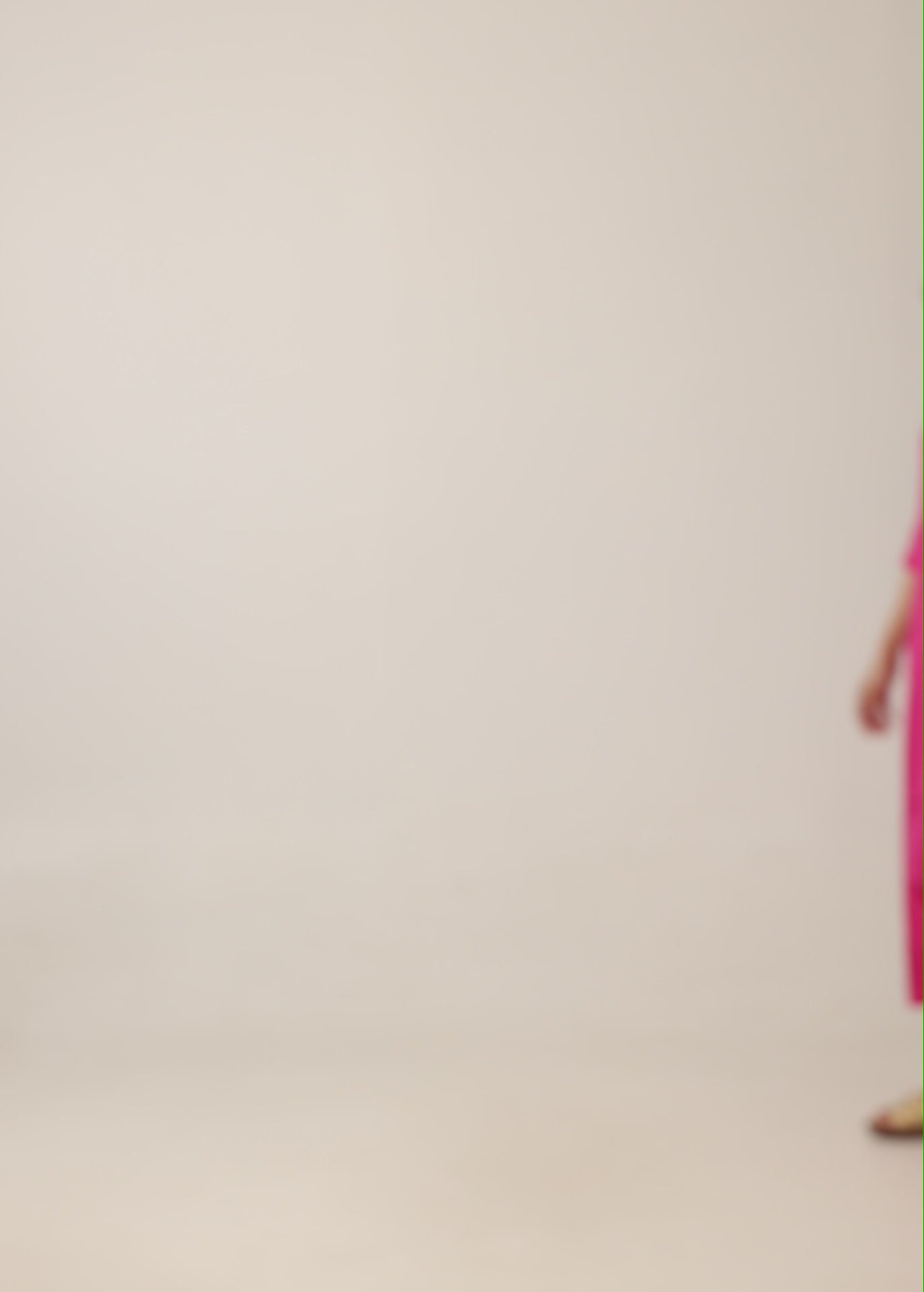 Fuchsia dress with a partial button placket and square pockets