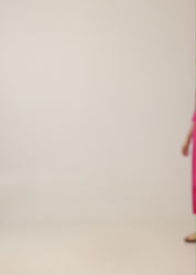 Fuchsia dress with a partial button placket and square pockets