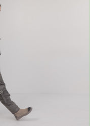 Dark gray and wash baggy pants with diagonal cuts and buckles