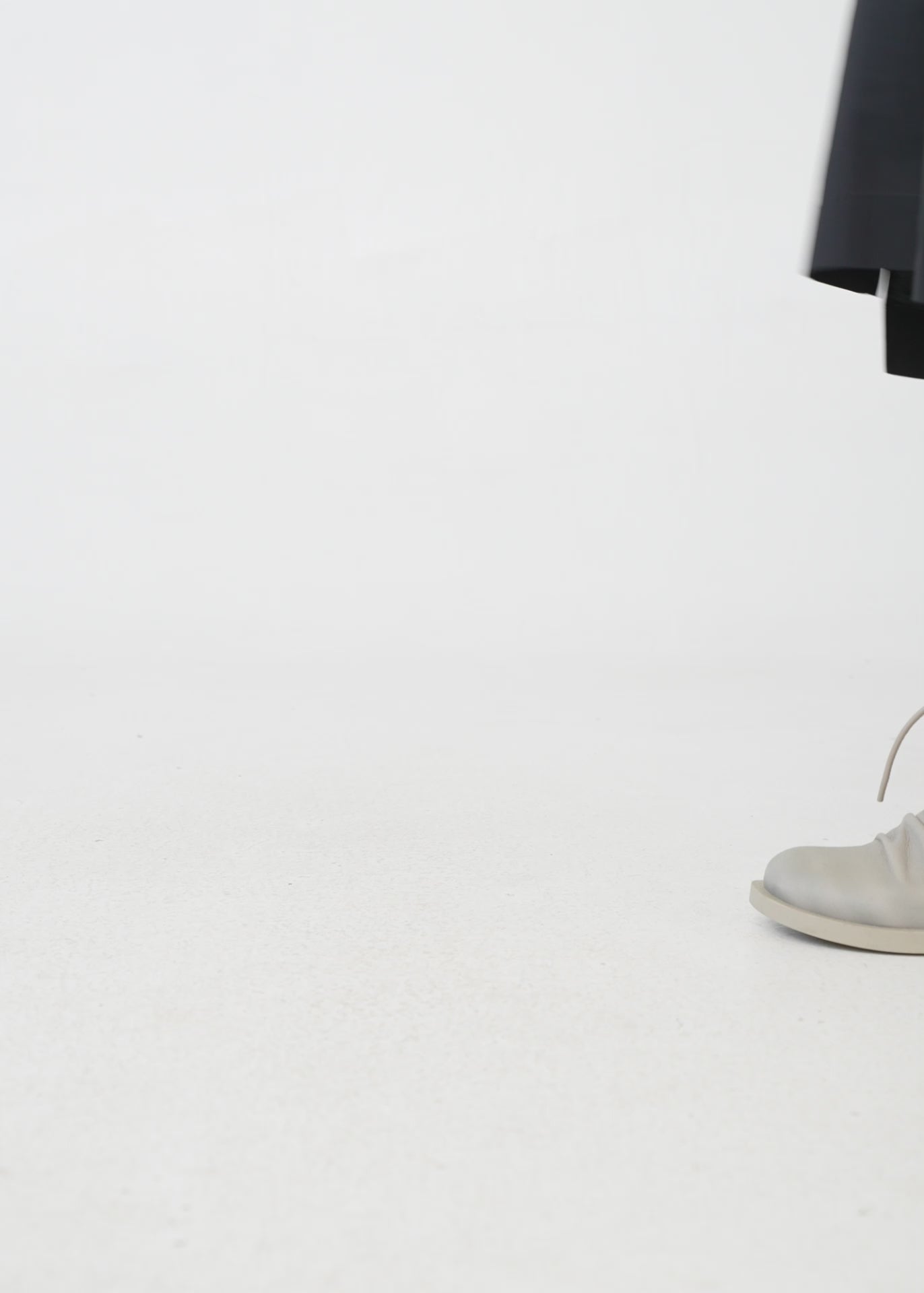 Women's boots with leather lacing and gray zipper