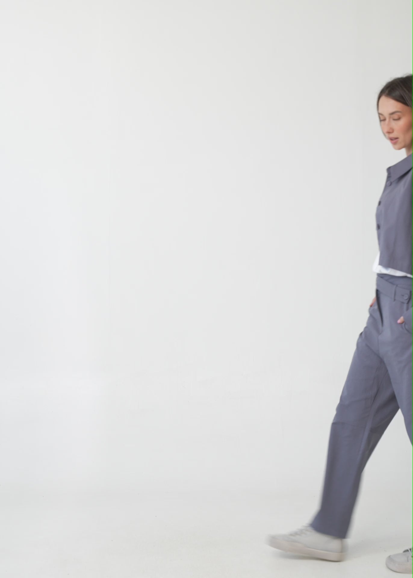 Long pants with brown diagonal belt