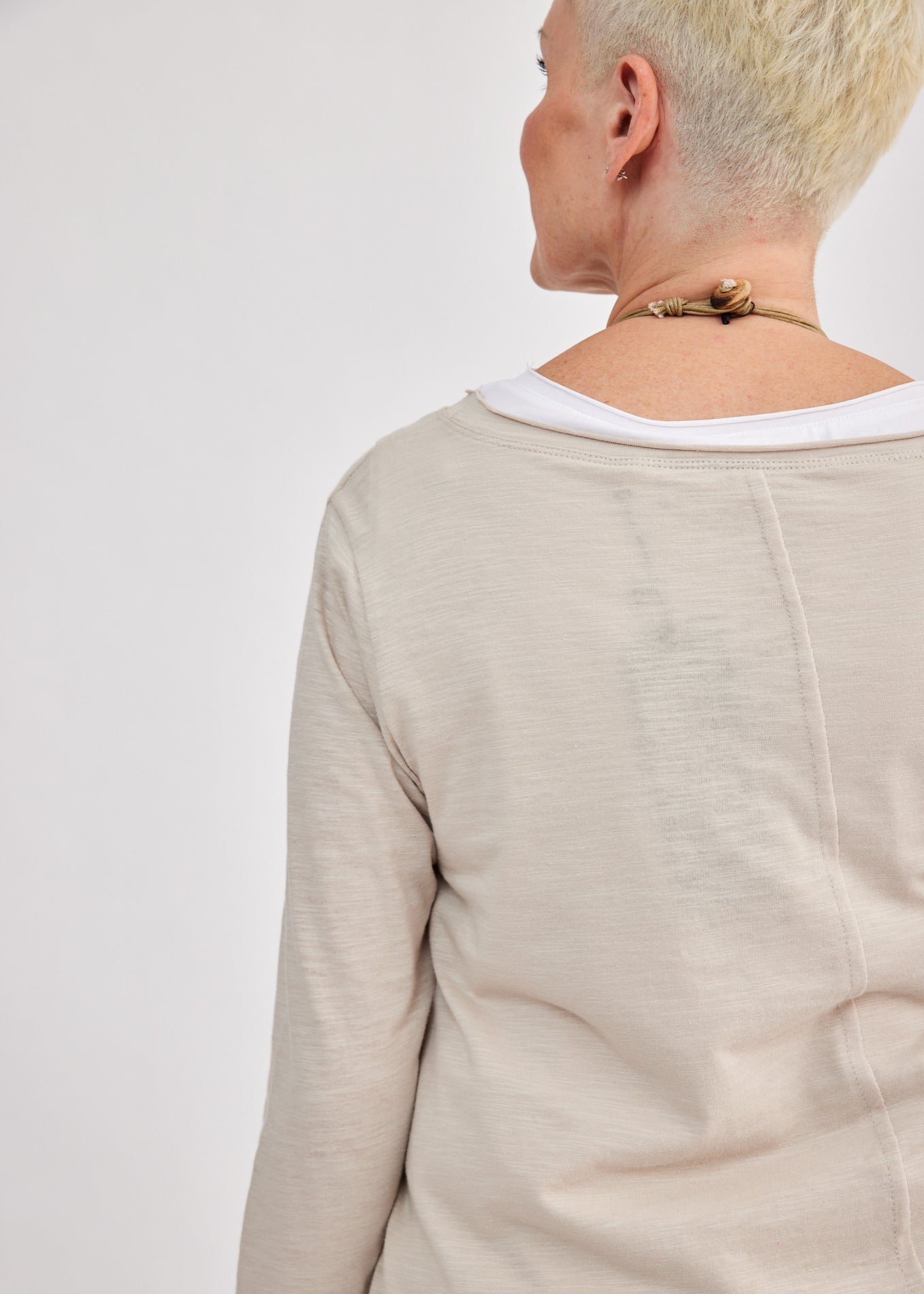 Long sleeve shirt diagonal asymmetrical stone collar 