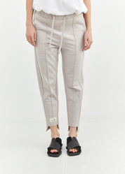 Pants seam in the middle and a gray patch